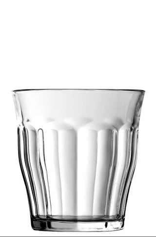Clear glass tumbler on a white background